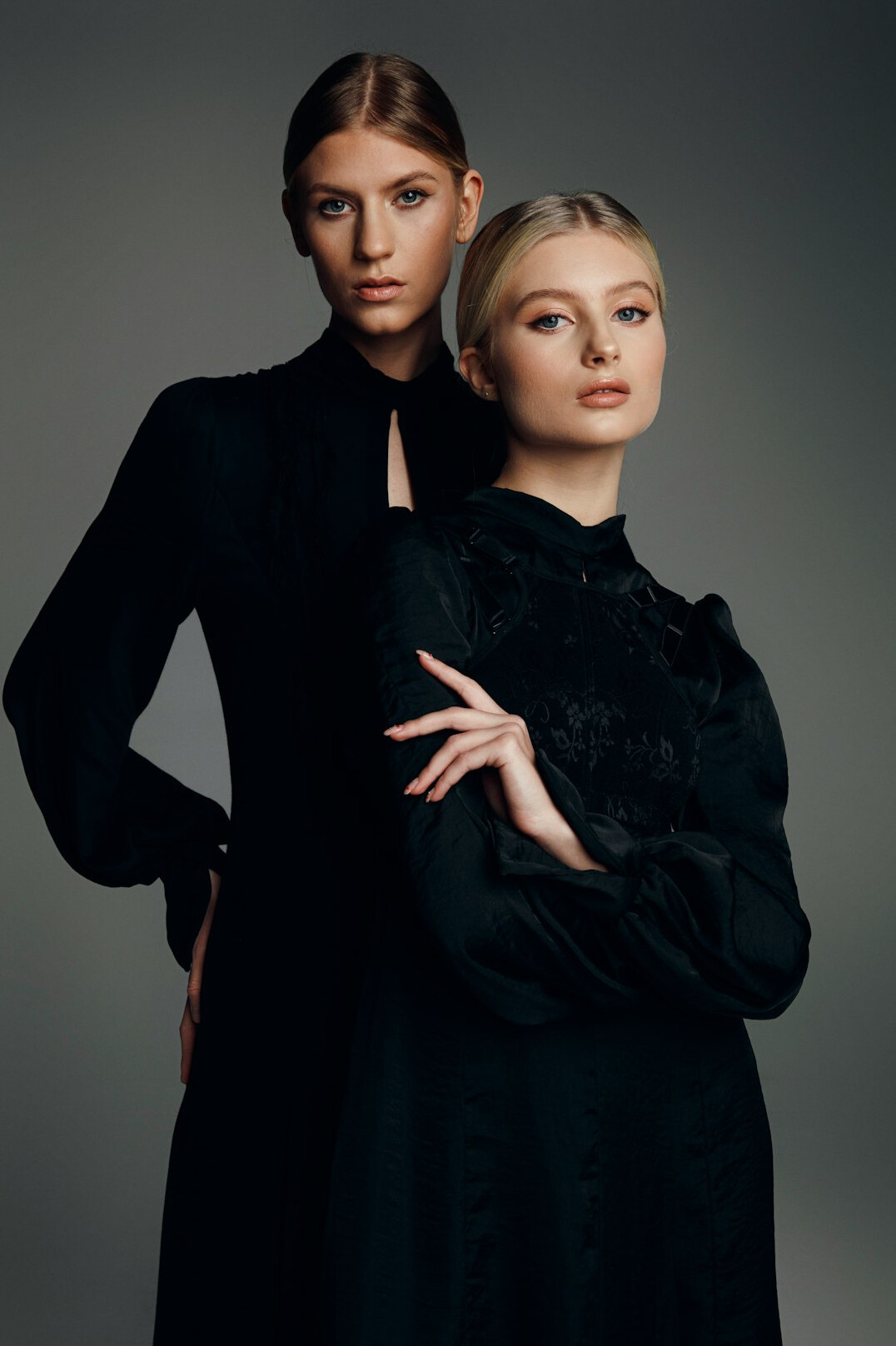 Fashion editorial portrait of a woman in elegant clothes